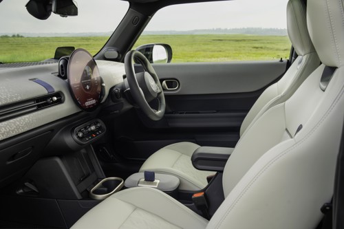 MINI Cooper Review: 3-Door's dashboard and front seats viewed from the passenger side